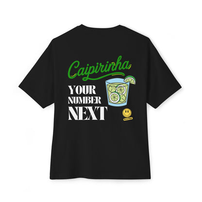 Black oversized tee with 'Caipirinha, Your Number Next' and a cocktail graphic