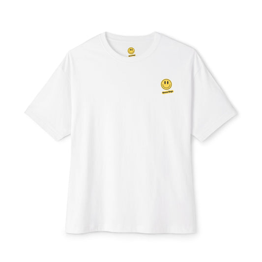 White oversized tee with a yellow smiley face design by Printify